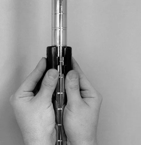 Two tapered sleeves being fitted around an Ultra Power post