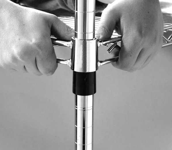 Chrome wire shelf being lowered onto a tapered sleeve