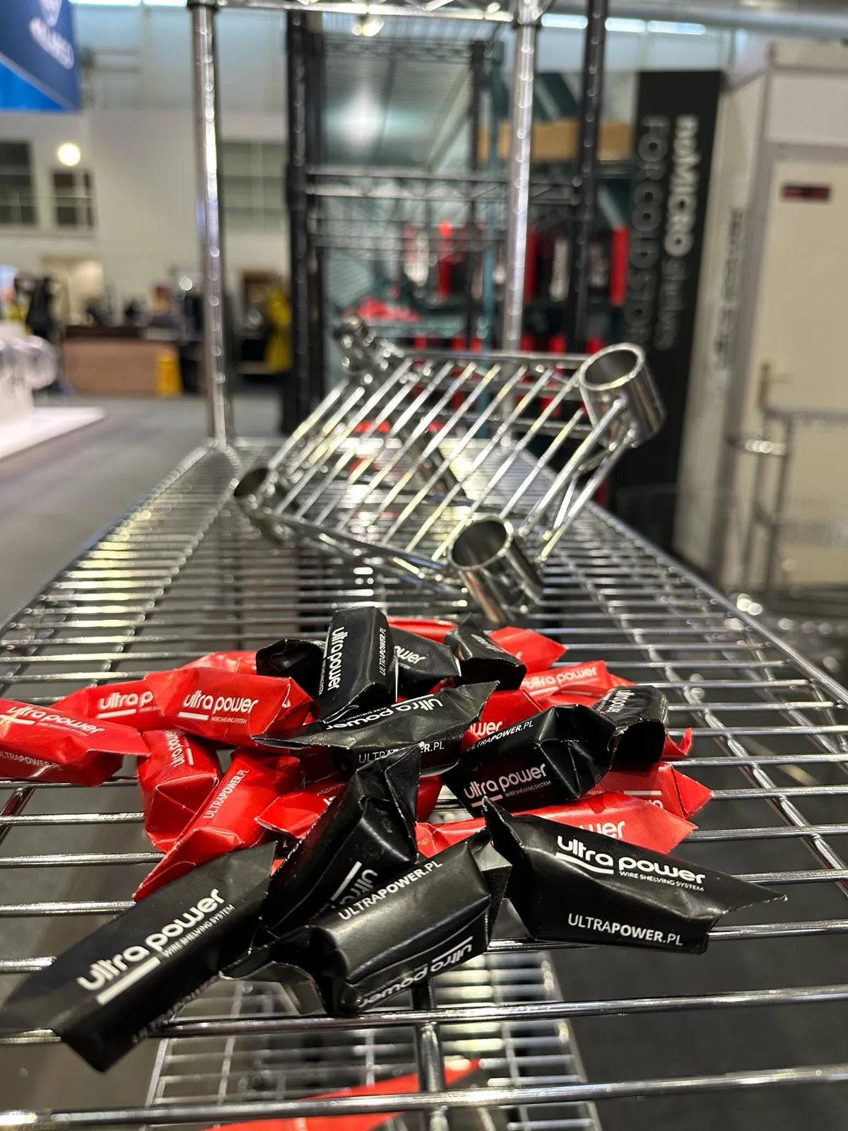 Ultra Power branded items displayed on a wire shelf at INTERNORGA 2024